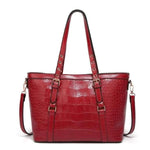 Red tote bag with faux crocodile leather
