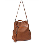 leather brown backpack with shoulder strap