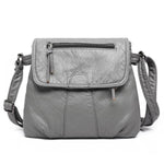 Gray leather flap bag with triple compartment