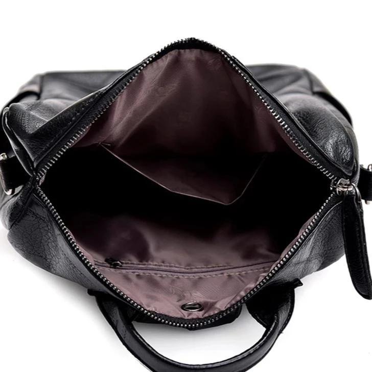 leather backpack with lots of pockets