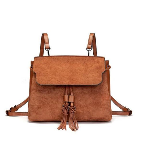 Brown backpack purse with tassels