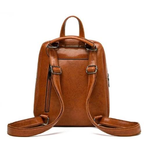 Brown leather backpack with convertible strap