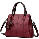 Red leather handbag with top handles