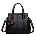 Black leather cross body handbags with top handles