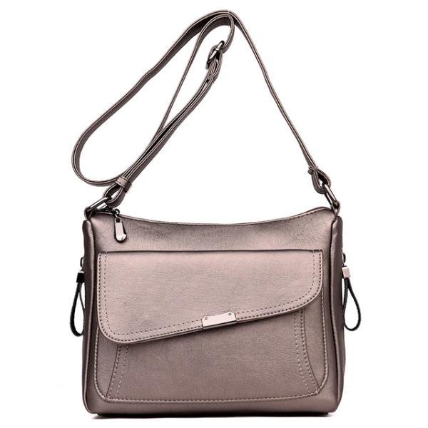 Bronze leather crossbody bag with large front pocket