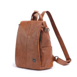 leather backpack with side pocket