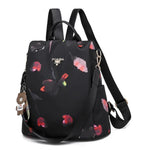 back and pink and red tulip backpack purse