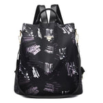 black and gray backpack purse