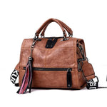 Brown Crossbody leather bag with tassels