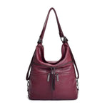 Red leather crossbody backpack bag