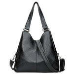 Black large leather handbag with top handles