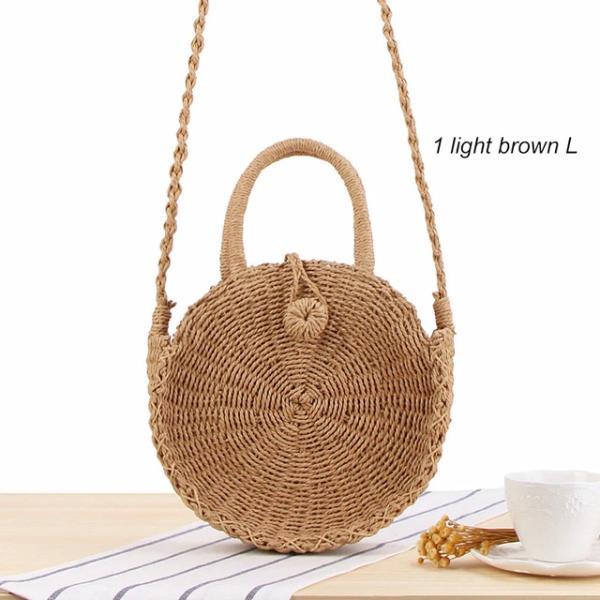 Light brown round straw crossbody bag with handle
