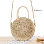 Light beige straw bag with handle and strap