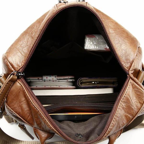 Brown vintage backpack top opening