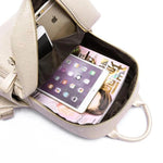Storage compartment fashion backpack