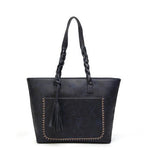 Blue leather tote bag with tassels