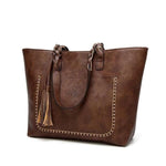 Coffe leather tote bag with tassels