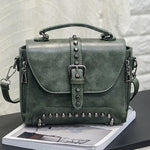 Green Vintage handbag with rivets and spikes