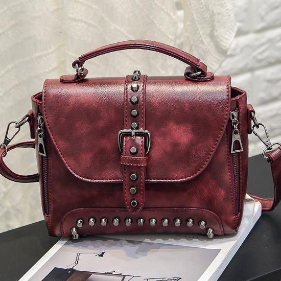 Red Vintage handbag with rivets and spikes