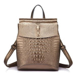 Gold crocodile backpack purse