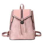 Pink leather convertible backpack purse with crossbody strap