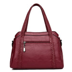 red handbag with back pockets