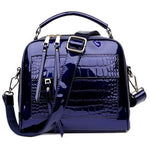 Blue shiny leather crossbody bags with two zipper compartments
