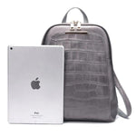 Silver leather backpack with ipad