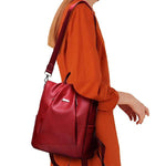 red leather backpack purse